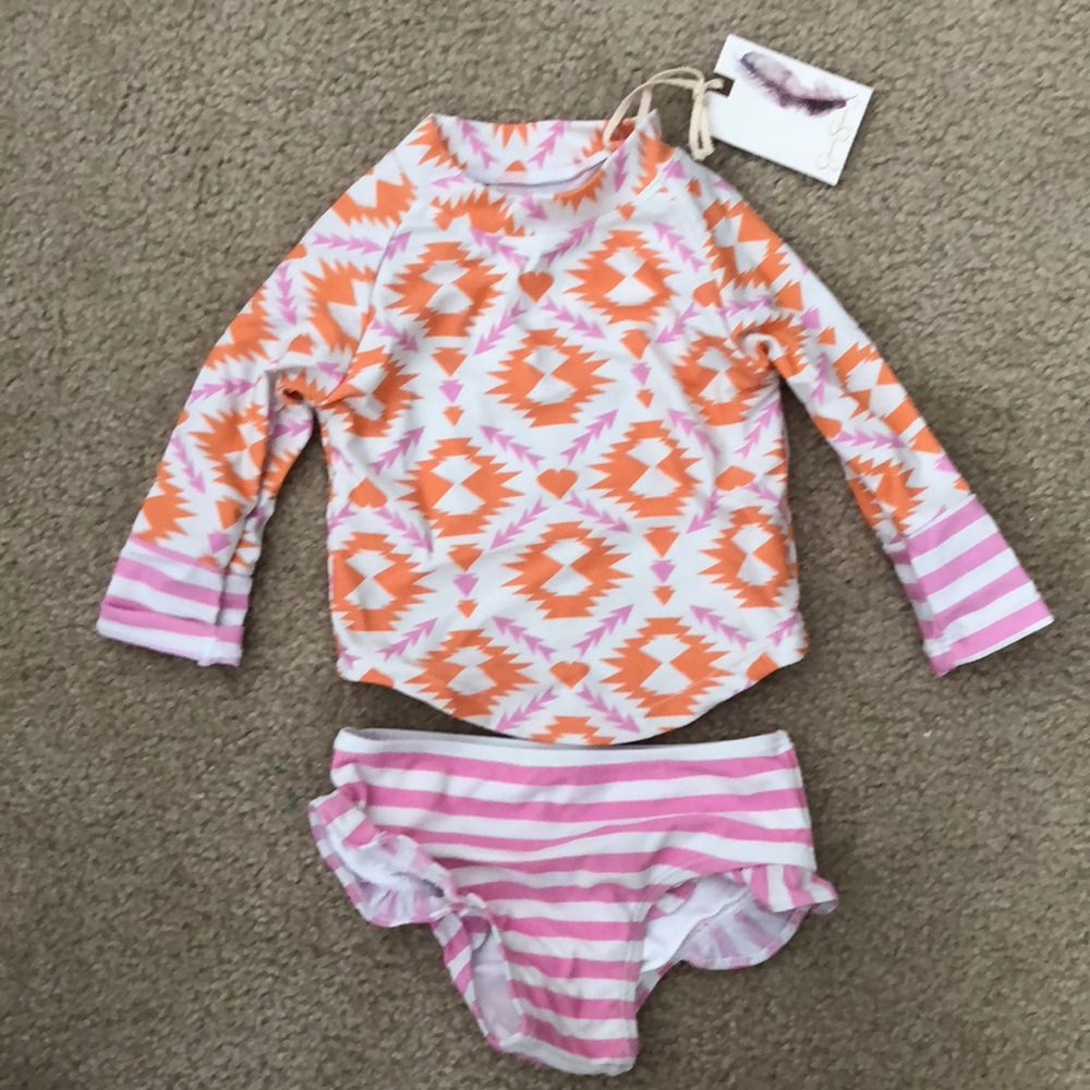 Jessica Simpson rash guard swimsuit